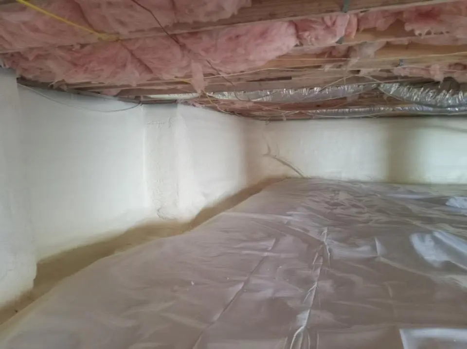 Crawl space encapsulation with closed-cell spray foam for Commercial Roof Restoration in Mayfair
